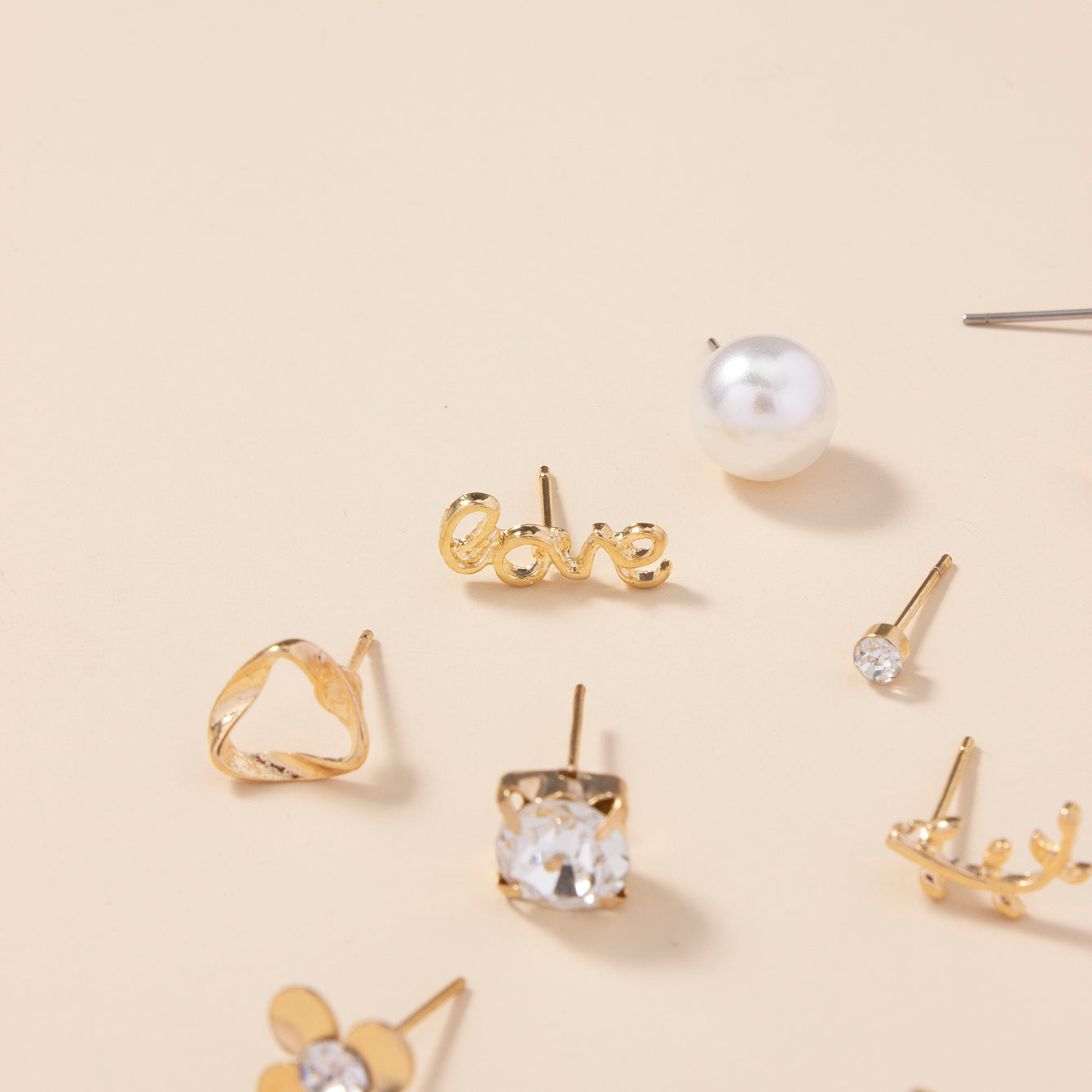 A Set of 30 Pairs of Stylish Alloy Heart-Shaped Faux Gemstone Letter Earrings.