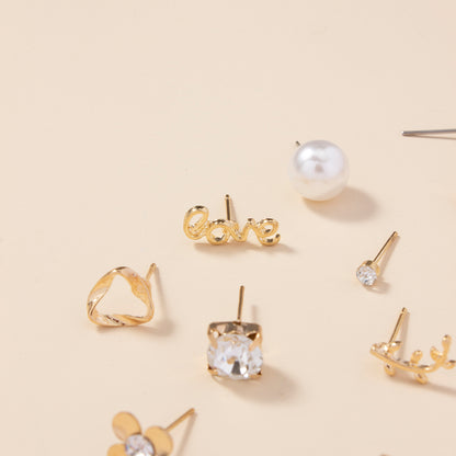 A Set of 30 Pairs of Stylish Alloy Heart-Shaped Faux Gemstone Letter Earrings.
